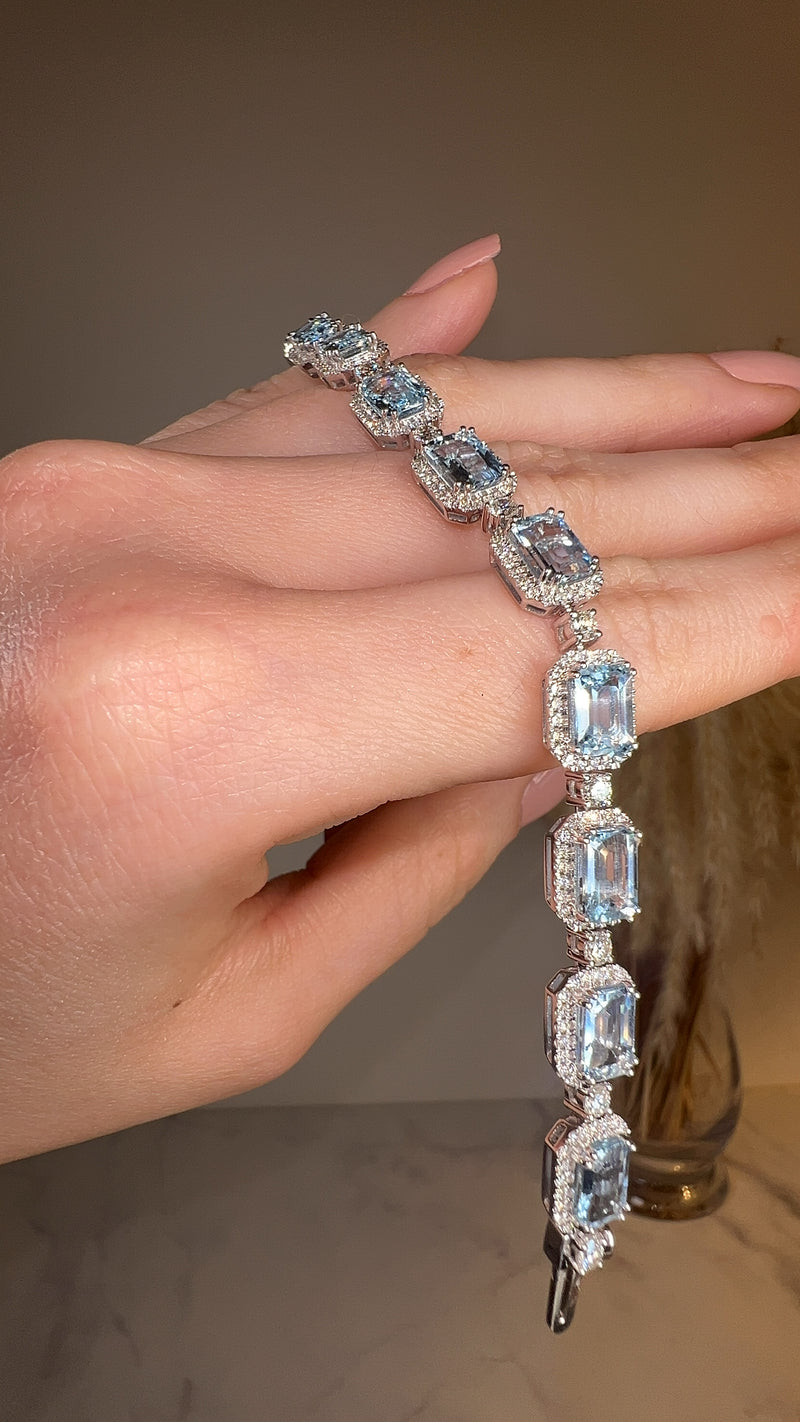 Emerald Shape 11 Carat Aquamarine Tennis Bracelet Featuring Diamond Halo BRHAEC