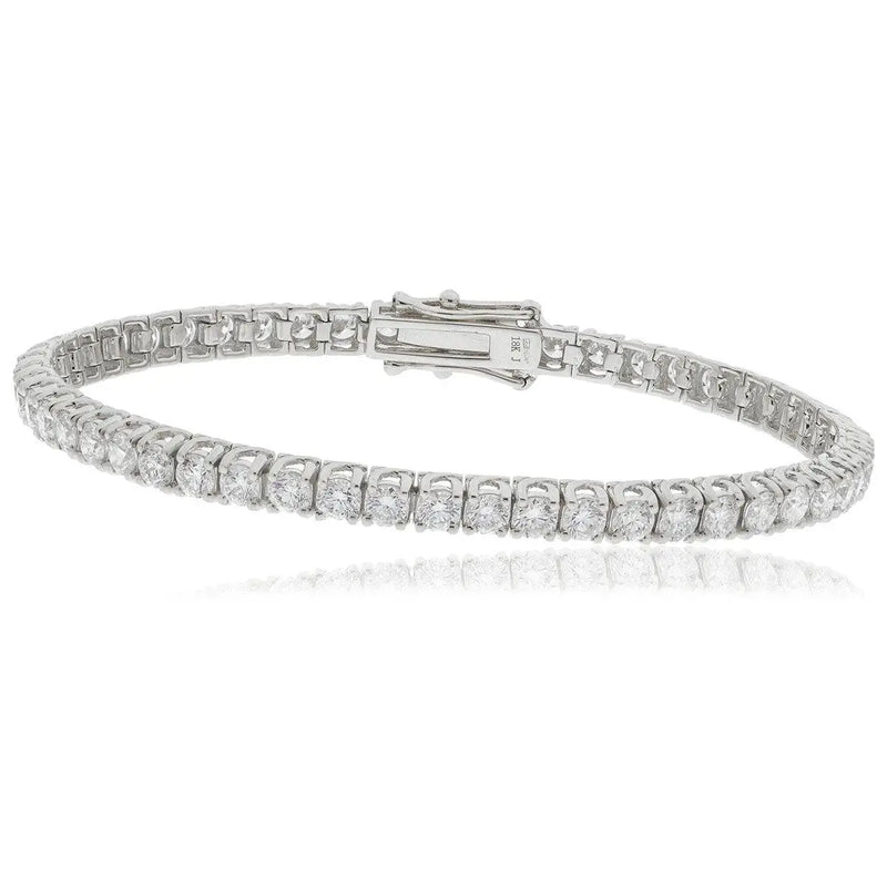 Round Cut Diamond Line Tennis Bracelet 4 Crossover Claw setting - HEERA DIAMONDS