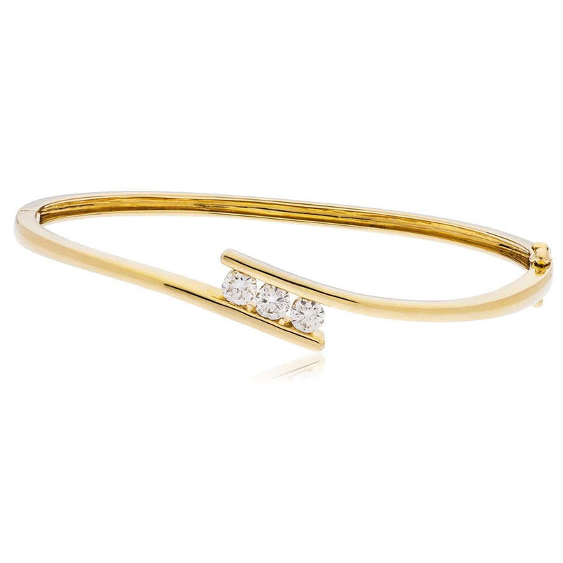 DIAMOND THREE STONE CROSS OVER BANGLE IN 18K YELLOW GOLD - HEERA DIAMONDS